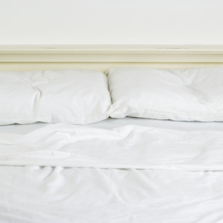 Still life of an unmade bed. Date : 2006