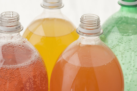 Closeup of open soda bottles. Date : 2006