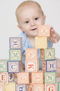 Baby playing with blocks. Date : 2007