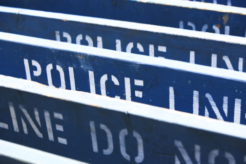 Row of Police Line barriers. Date : 2007