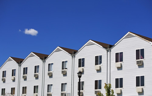 Row houses under blue sky. Date : 2007