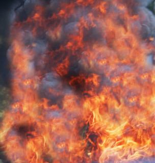 Full frame view of fire and smoke. Date : 2007