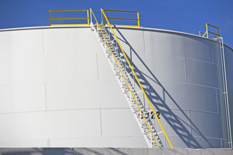 Ladder on cylindrical container. Date : 2007