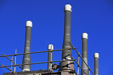 Low angle view of high voltage station. Date : 2007