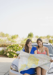 Young women looking at map. Date : 2007