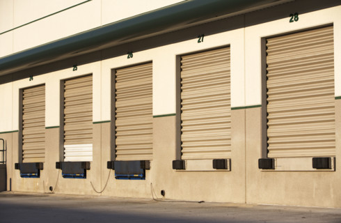 Row of closed loading docks. Date : 2007