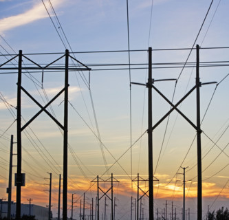 Electrical poles and wires at sunset. Date : 2007