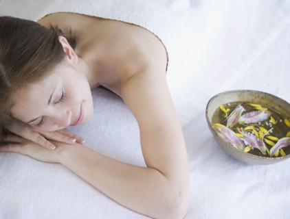 Woman laying on spa table. Date : 2007