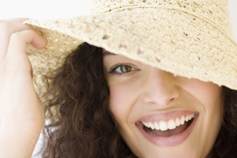 Woman wearing sunhat. Date : 2007
