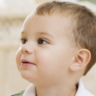 Close up of baby looking to side. Date : 2007