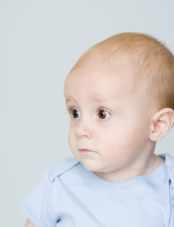 Close up of baby looking to side. Date : 2007