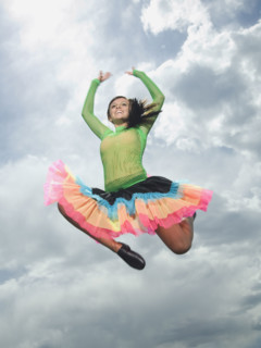 Low angle view of woman jumping. Date : 2007