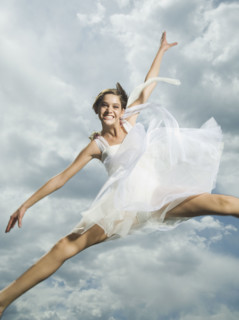 Low angle view of woman jumping. Date : 2007