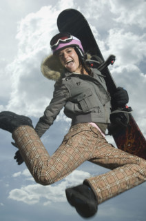 Low angle view of snowboarder jumping. Date : 2007