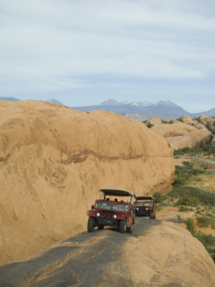 Off-road vehicles driving on rock formation. Date : 2007