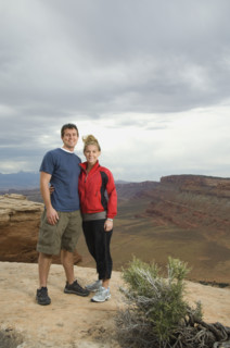 Couple standing at edge of cliff. Date : 2007