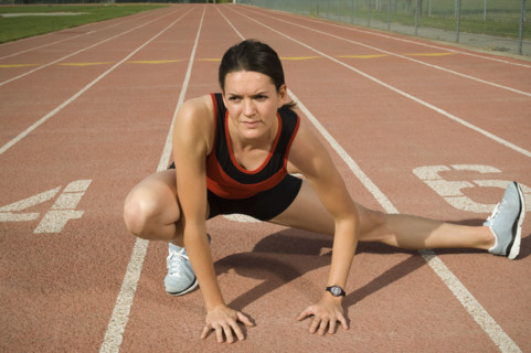 Female runner stretching, Utah, United States. Date : 2007