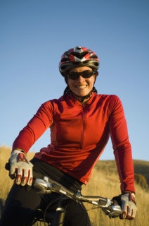Woman on mountain bike, Salt Flats, Utah, United States. Date : 2007