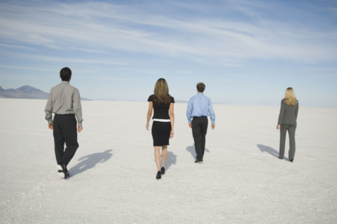 Businesspeople walking on salt flats, Salt Flats, Utah, United States. Date : 2007