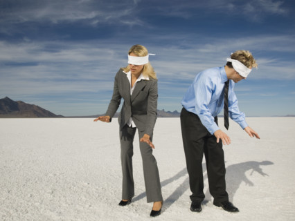 Blindfolded businesspeople on salt flats, Salt Flats, Utah, United States. Date : 2007