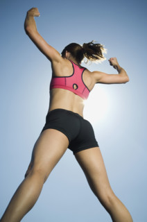 Rear view of woman in athletic gear. Date : 2007