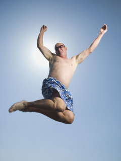 Man in bathing suit jumping. Date : 2007