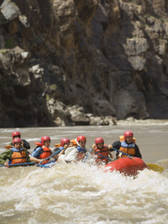 Group of people river rafting. Date : 2007