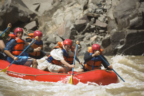 Group of people river rafting. Date : 2007