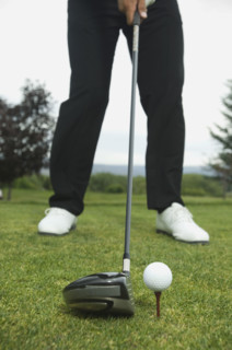 Close up of man playing golf. Date : 2007