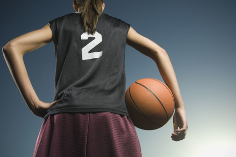 Girl holding basketball. Date : 2007