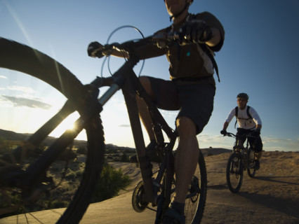 People riding mountain bikes. Date : 2007