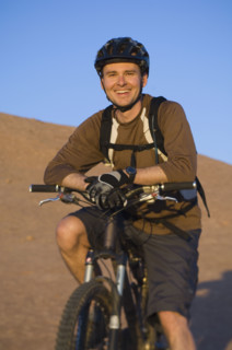 Man sitting on mountain bike. Date : 2007