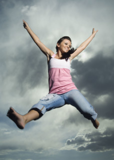 Low angle view of woman jumping. Date : 2007