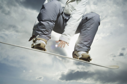 Low angle view of snowboarder. Date : 2007