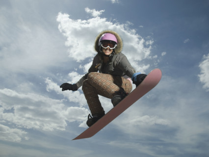 Low angle view of snowboarder jumping. Date : 2007