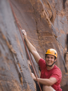 Close up of man rock climbing. Date : 2007