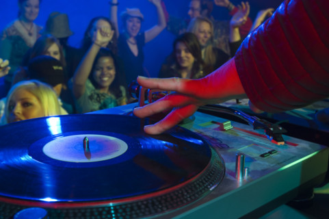 Crowd cheering for DJ. Date : 2007