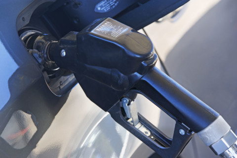 pumping gas in a car. Date : 2007