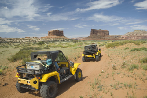 Off-road vehicles driving through desert. Date : 2007