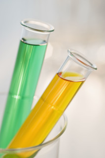 Multi-colored liquids in vials.
