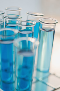 Vials of liquid in tray.