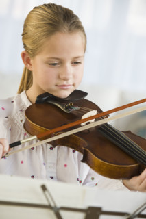 Girl playing violin.