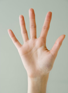Close up of woman’s hand.