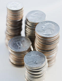 Close up of stacks of coins.