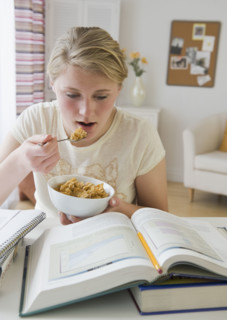 Teenaged girl doing homework.