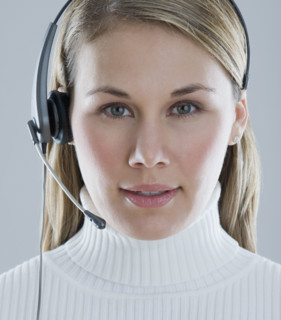 Woman wearing headset.