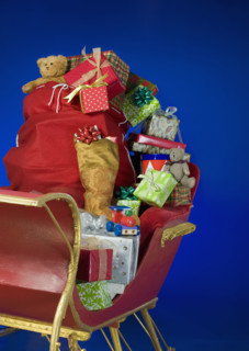 Sleigh with bag of Christmas toys.