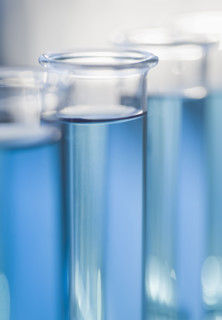 Close up of liquid in vials.