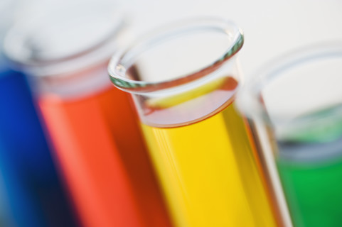 Multi-colored liquids in vials.