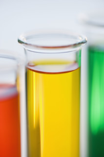 Multi-colored liquids in vials.